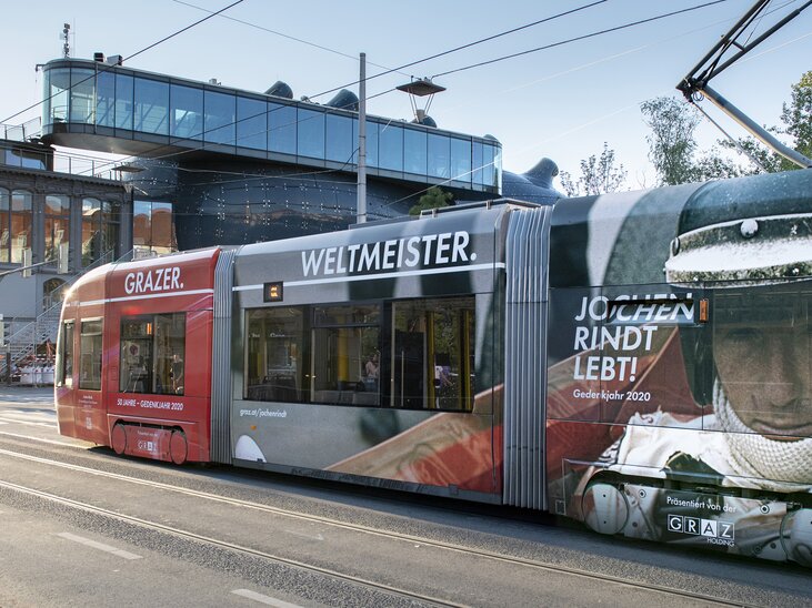 A tram in Graz featuring "Weltmeister" and advertisement for Jochen Rindt. | © Christian Jungwirth