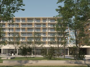 Vista architettonica di un edificio residenziale circondato da alberi. | © SCM Parken GmbH