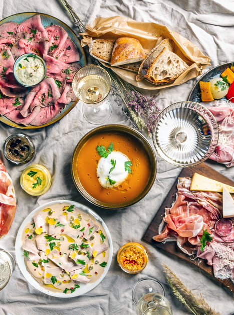 An abundant variety of culinary delights displayed on a table. | © Paul Stajan