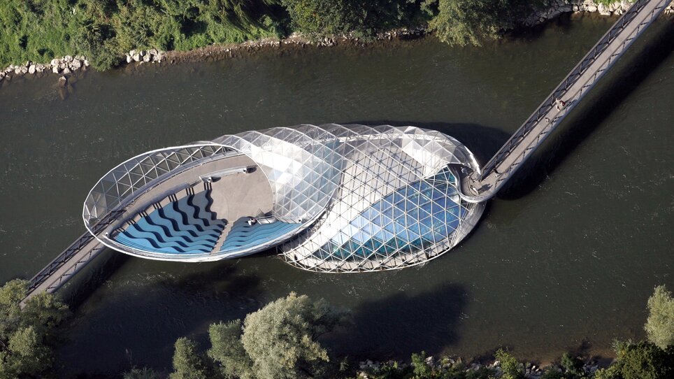 Modern floating island café on the Mur River in Graz, featuring unique architecture. | © Graz Tourismus - GEPA