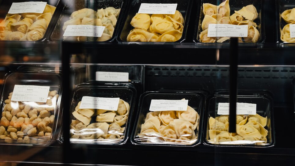 Fridge with various pasta and jars. | © Pastaria