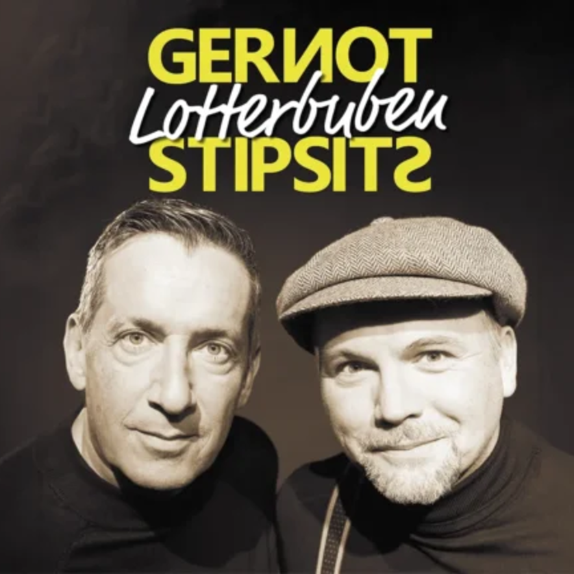 Zwei Männer posieren für ein Foto mit dem Schriftzug Gernot Lotterbuben Stipsits. | © Lukas Beck