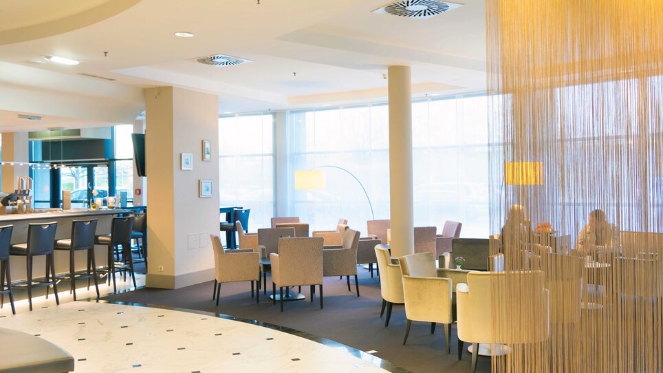 Lounge-Bereich des Hotel Ramada Graz in Graz für Geschäftstreffen und Networking. | © Hotel Ramada Graz