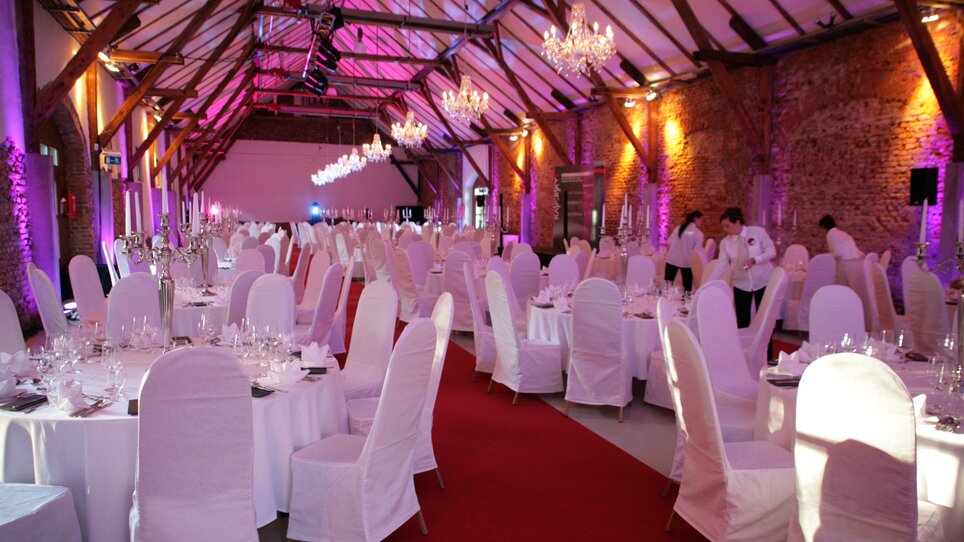 Wedding or event location with festive ambiance and tables. | © Revita Gastronomie