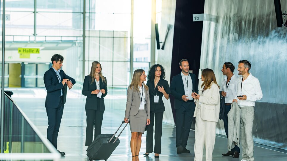 Business people conversing during a conference at Messe Graz. | © Graz Tourismus - Mias Photoart