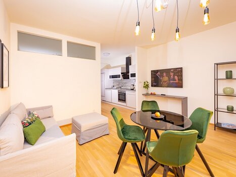 Modern apartment with dining area and kitchen