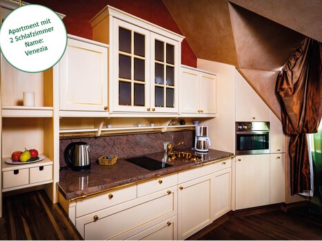 Area cucina dell'appartamento con fornitura di legno  | © Grossauer Tourismus