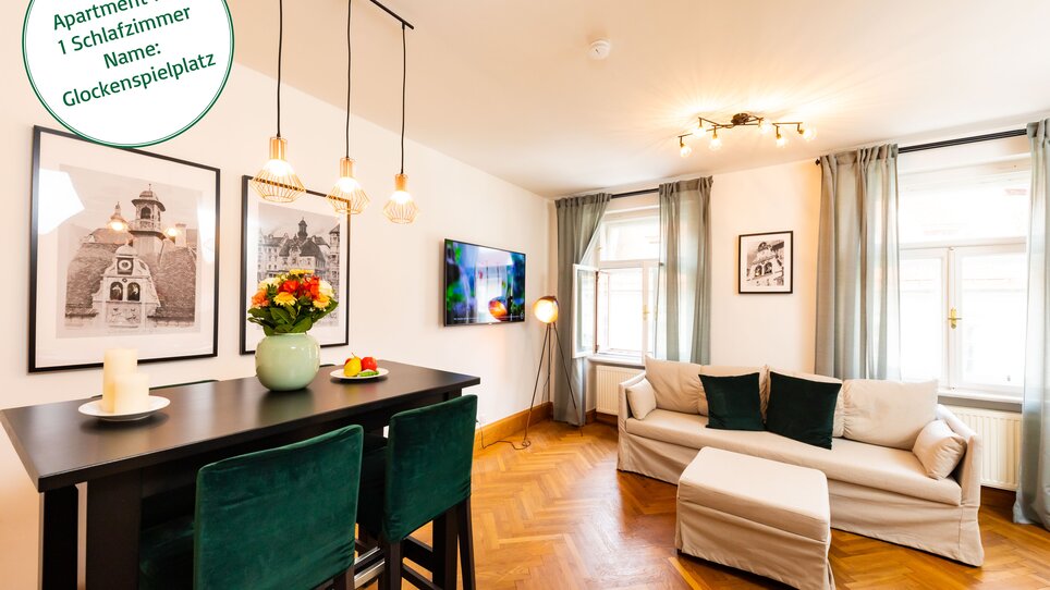 Vista interna di un appartamento con zona pranzo e soggiorno. | © Grossauer Tourismus